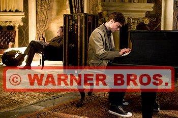 Harry au piano aux côtés de Horace Slughorn